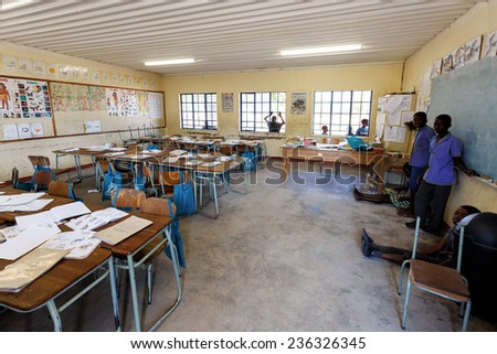 NAMIBIA, KAVANGO, OCTOBER 15: Happy Namibian school children waiting for a lesson. Kavango was the region with the highest poverty level in Namibia. October 15, 2014, Namibia