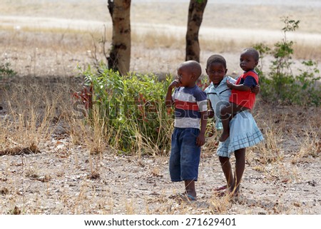 NAMIBIA, KAVANGO, OCTOBER 15: unidentified dirty and poor Namibian children near town Rundu in Kavango region, with the highest poverty level in Namibia. October 15, 2014, Namibia