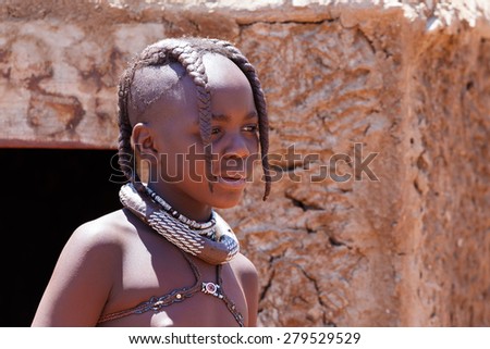 NAMIBIA, KAMANJAB, OCTOBER 10: Unidentified child Himba tribe. The Himba are indigenous peoples living in northern Namibia, in the Kunene region of South-West Africa on october 10 2014