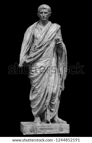Caesar Octavianus Augustus roman emperor adopted son of Julius Caesar. Isolated statue on black