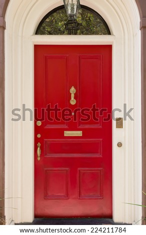 Red Front Door with White Archway Door Frame