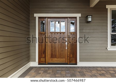 Front dark brown door that is closed