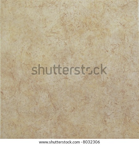 Light brown ceramic tile with scratched pattern