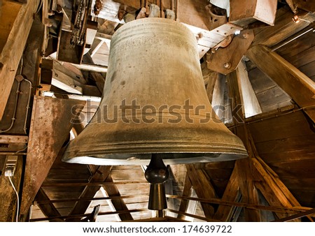One of the large old bronze bells in the bell tower of the Notre Dame Cathedral in Paris.