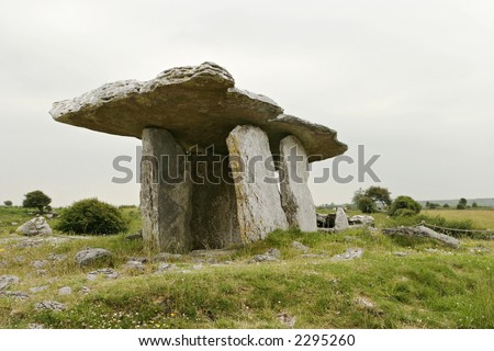 The stone table at Poulnabroun is an ancient Celtic relic that was a tomb or dolmen. The enormous slabs of rock protected the dead from the elements. On this overcast day, it dominated the landscape.