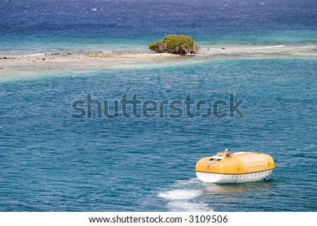 A cruiseship lifeboat, on training exercises during a cruise, approaches a desert island with just one scrub tree on it. The island, on a coral reef, is surrounded by the blue ocean.