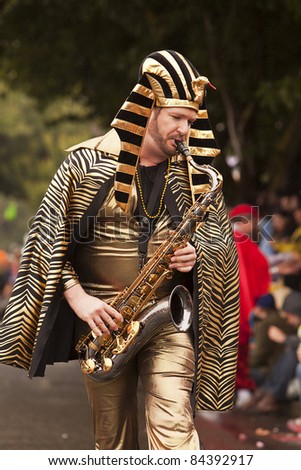 SEATTLE, WA - JUNE 18:  An unidentified musician marches in the 2011 Annual Fremont Summer Solstice Day Parade while dressed as King Tut on June 18, 2011 in Seattle, WA. The parade celebrates the start of summer.