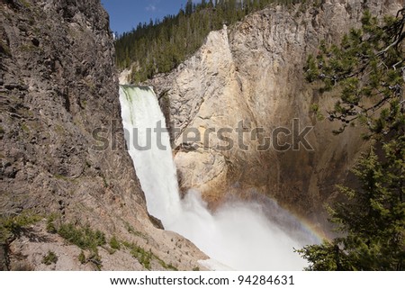 Lower Yellowstone Falls is one of the larger natural waterfalls in the country. Enough spray is created from the cascading water to generate a rainbow as seen in the lower right of the frame.