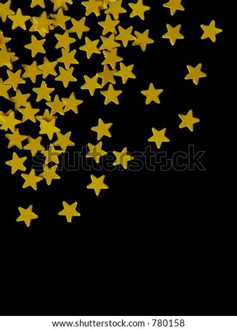 black and gold stars background. gold stars on lack