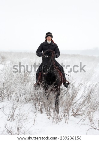 Countryside trail riding in winter evening