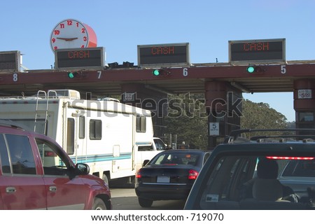Moterists slow down to toll at the Golden Gate Bridge.