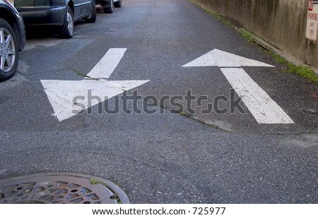Two way traffic arrows on a street in San Francisco.