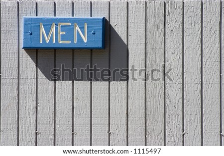 The marker for a menâ€™s bathroom at a roadside rest stop.