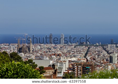 View of the City of Barcelona from a nearby hill. You can view the Sagrada Familia church at left.
