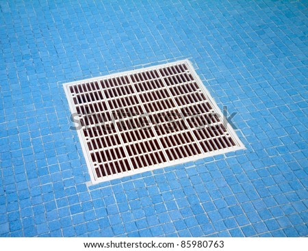 Underwater view of a large filter for pool cleaning. Shot with SLR underwater case.