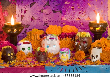 Mexican Day of the dead altar created entirely for this image session Carefully arranged all the pieces candles and flowers Front View Mexican Day of the dead altar created entirely for this image session Carefully arranged all the pieces candles and flowers Front View