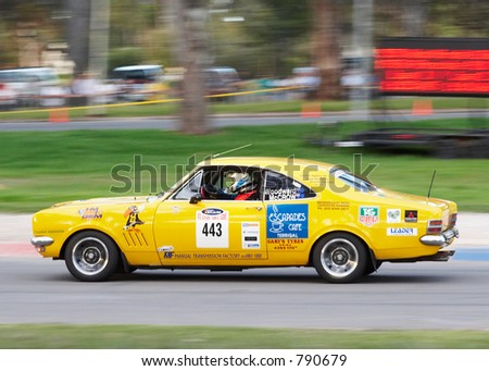 stock photo A Yellow Holden GTS Monaro racing at Classic Adelaide Prologue