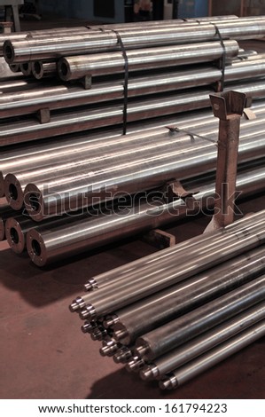 steel fabrication, metal bars stored in warehouse