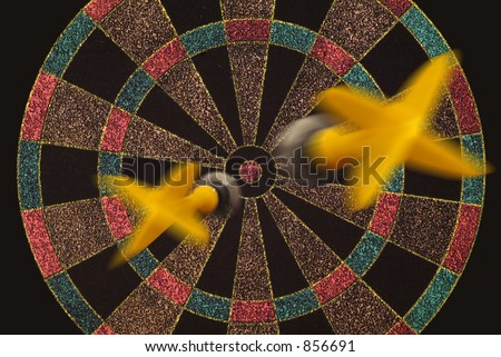 Two darts flying to target