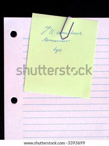 Yellow paper on lined paper background, with clipping path