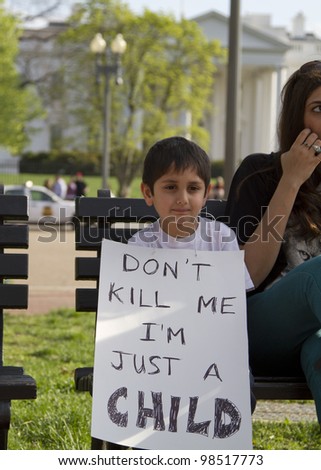 WASHINGTON, DC - MARCH 25: Unidentified family protests at White House after U.S. Army Staff Sargent Robert Bales charged, 17 counts of murder killing 8 adults and 9 children in Afghanistan. Washington, DC, March 25, 2012
