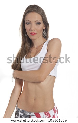 A beautiful young woman in 	a white tee shirt on a white background
