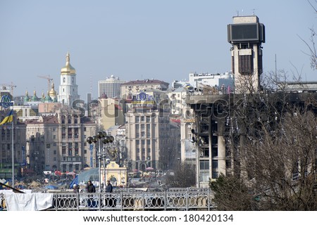 View of the independence square and burnt down the House of trade unions from the Instytutska Street, 07.03.2014.