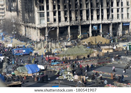 View of the independence square and burnt down the House of trade unions from the Instytutska Street, March 07, 2014.