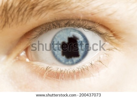 A close-up of an eye with the pupil in the shape of Mauritania.(series)