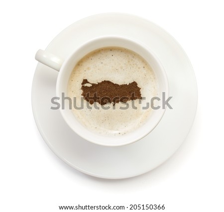 A cup of coffee with foam and powder in the shape of Turkey.(series)