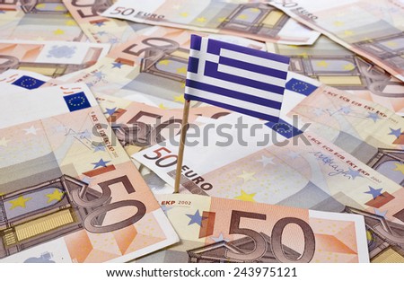 Flag of Greece sticking in european banknotes.(series)