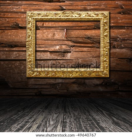 Grunge wooden room interior and gold frame