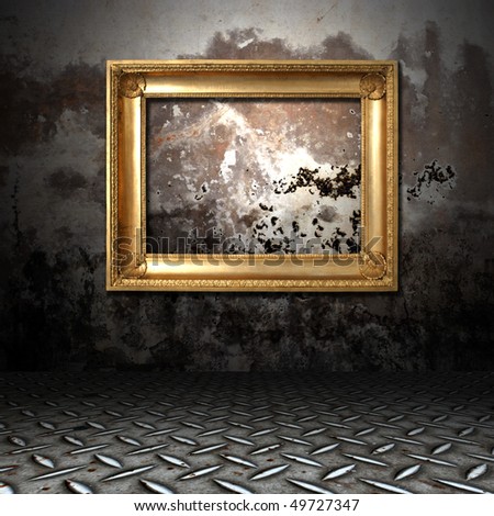 gold frame in a dark grungy room