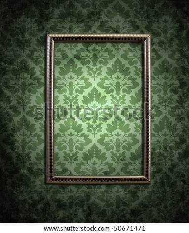 dirty green wallpaper and an empty frame