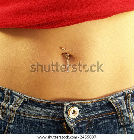 Diamond and silver belly button young woman