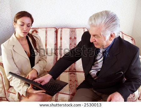 Sales Manager checking the sales results with sales person