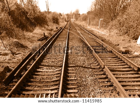 Vintage rail track in monochrome perspective background
