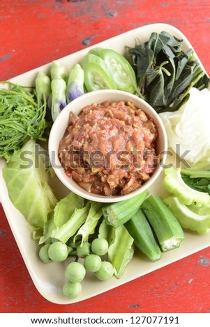 original Thai food with carved vegetables on well decorated plate