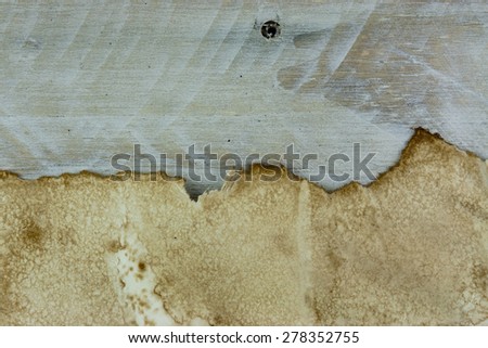 Piece of old paper on wooden planks