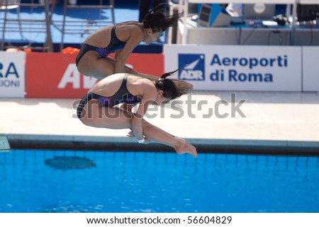 ROME - JULY 24: Women trampoline 3m finals, 13th FINA World Championships at Foro Italico on July 24, 2009 in Rome, Italy. Guo JingJing and Wu MingXia Chinese won Gold Medal.