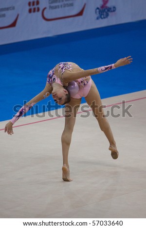PESARO, ITALY - MAY 2: Yevgeniya Kanayeva, Russia, competes in individual exercise with ball at Rhythmic Gymnastic World Cup 2009 on May 2, 2009 in Pesaro, Italy
