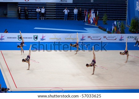 PESARO, ITALY - MAY 2 : Italian Team, competes in team exercise with 5 hoops at Rhythmic Gymnastic World Cup 2009 on May 2, 2009 in Pesaro, Italy