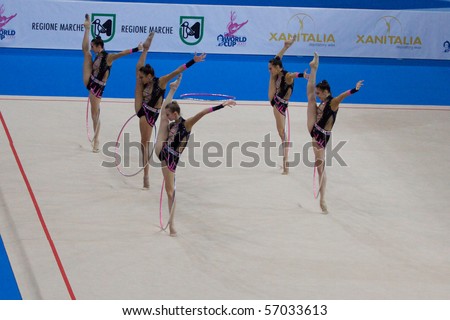 PESARO, ITALY - MAY 2: Italian Team, competes in team exercise with 5 hoops at Rhythmic Gymnastic World Cup 2009 on May 2, 2009 in Pesaro, Italy