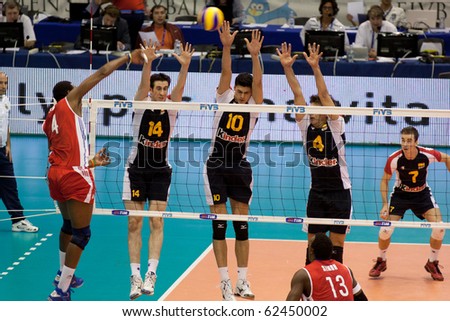 FLORENCE, ITALY - OCTOBER 5: cuban Joandy Leal Hidalgo spikes ball at Volleyball World Championships  Spain vs Cuba at Nelson Mandela Forum in Florence on October 05, 2010