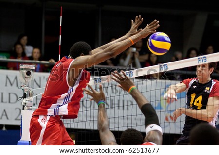 FLORENCE, ITALY - OCTOBER 5: spain player Ibn Perez spikes ball at Volleyball World Championships  Spain vs Cuba at Nelson Mandela Forum in Florence on October 05, 2010
