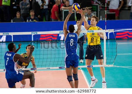 ROME, ITALY - OCTOBER 10: Cuba Rolando Cepeda Abreu stops ball at before Volleyball World Championships  final match Brazil vs Cuba at Palalottomatica in Rome on October 10, 2010