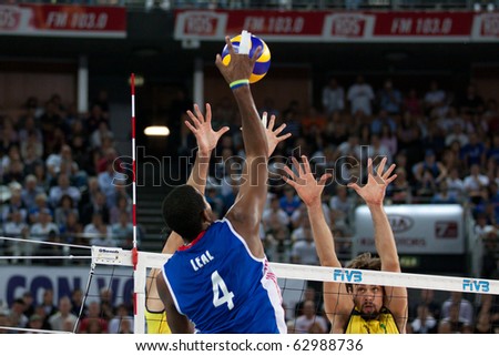 ROME, ITALY - OCTOBER 10: Cuba Joandy Leal Hidalgo spikes ball at Volleyball World Championships  final match Brazil vs Cuba at Palalottomatica in Rome on October 10, 2010