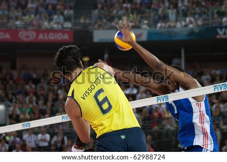 ROME, ITALY - OCTOBER 10: Brazil GLeandro Vissotto Neves spikes ball at Volleyball World Championships  final match Brazil vs Cuba at Palalottomatica in Rome on October 10, 2010