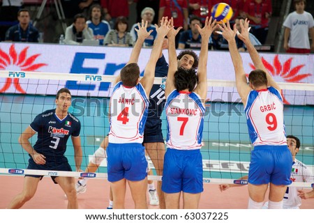 ROME, ITALY - OCTOBER 10: Italy Alessandro Fei spikes ball at Volleyball World Championships bronze medal match Italy vs Serbia at Palalottomatica in Rome on October 10, 2010