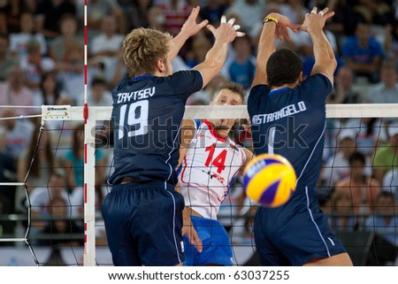 ROME, ITALY - OCTOBER 10: Serbia Ivan Miljkovic spikes ball at Volleyball World Championships bronze medal match Italy vs Serbia at Palalottomatica in Rome on October 10, 2010